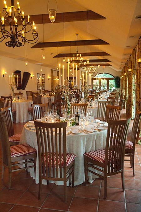 The winery restaurant, Palladio, celebrates a special feast with elegant linens and candles. Barboursville Vineyards.