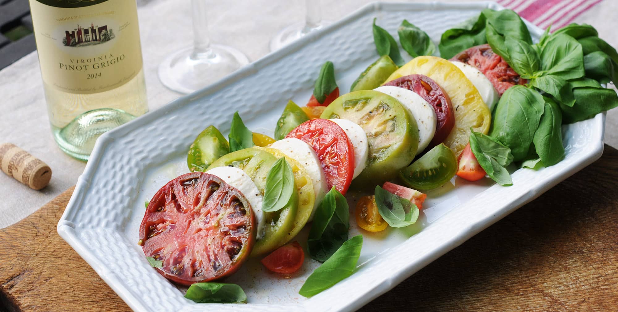 Palladio Caprese Salad of heirloom tomatoes with Barboursville Vineyard's Pinot Grigio wine.