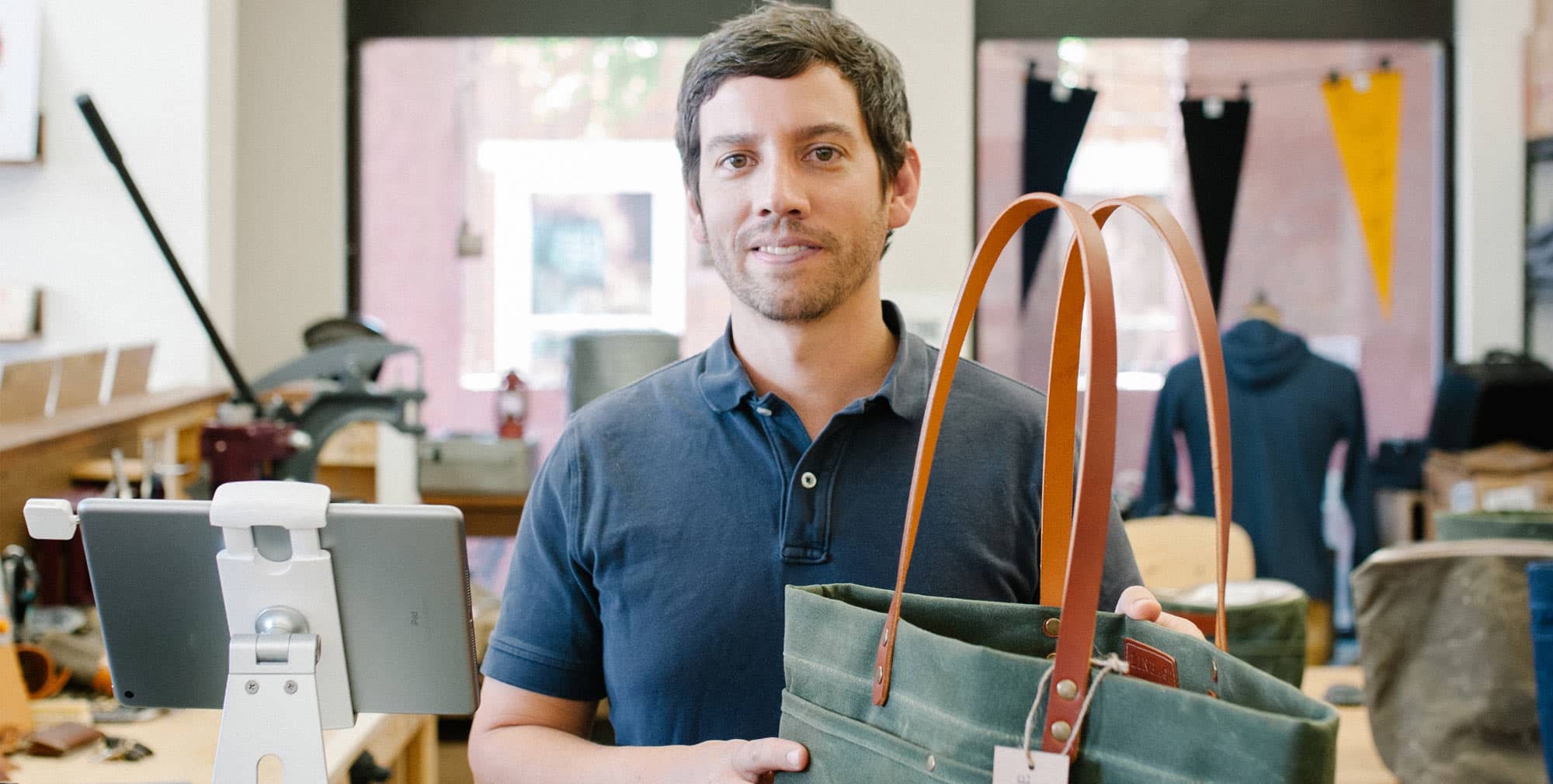 Man holding up bag