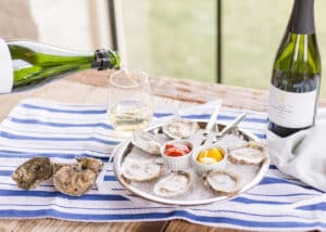 Photo of oysters and a bottle of wine at Early Mountain Vineyards