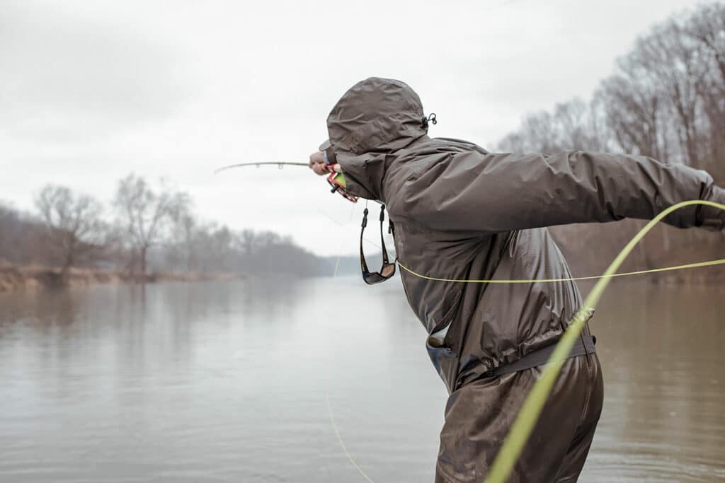 Man casting out rod