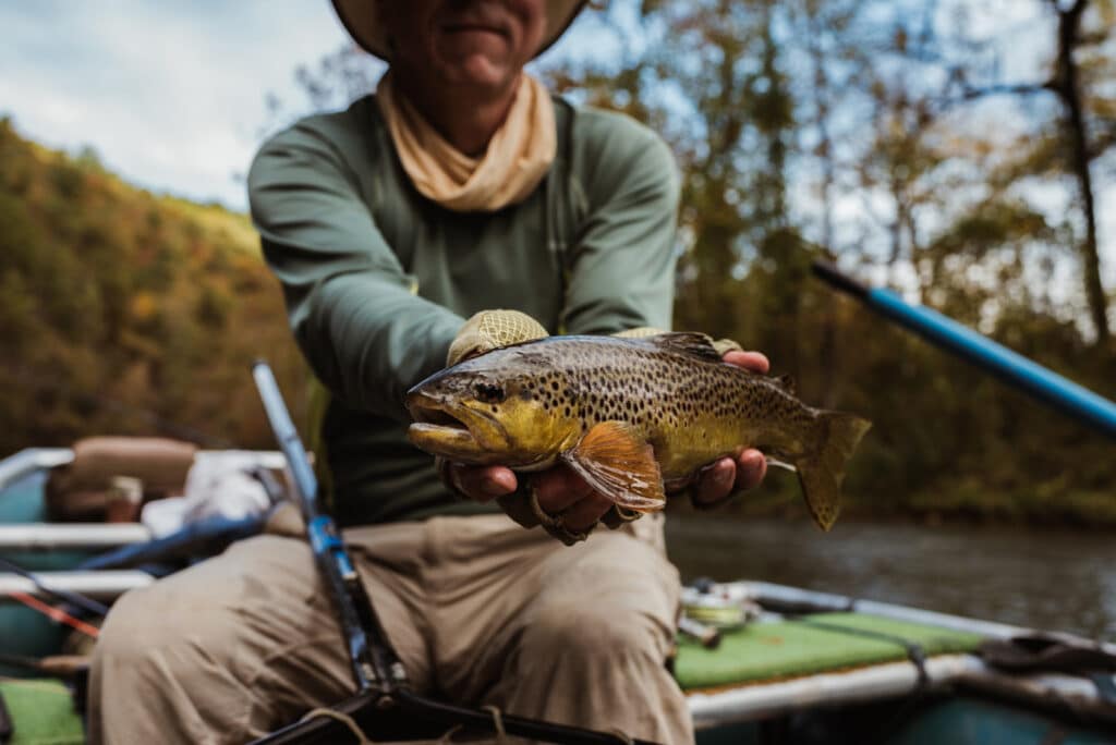 Man holding out fish