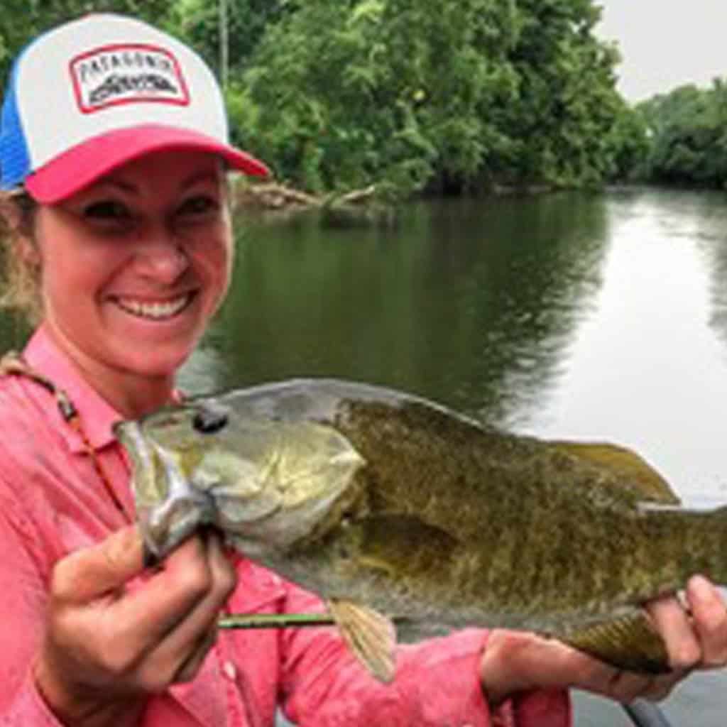 Women holding up fish