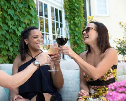 Women enjoying wine at Salamander Resort