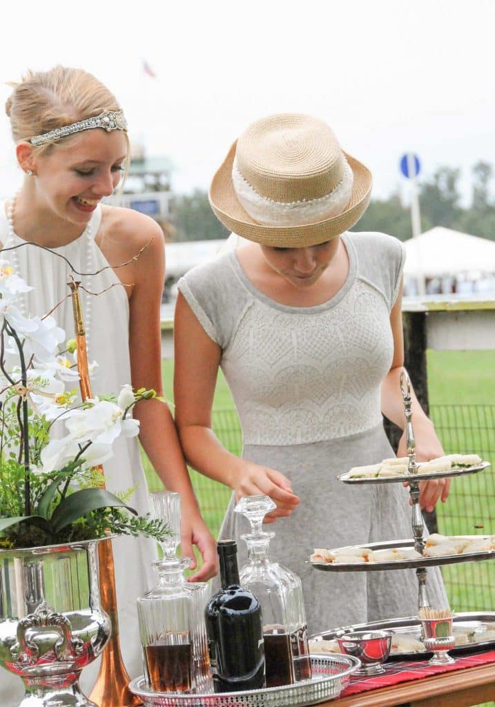 Attendees eating tailgate food at Foxfield races