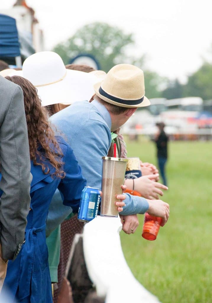 Spectators wearing hats at the Foxfield races in Charlottesville