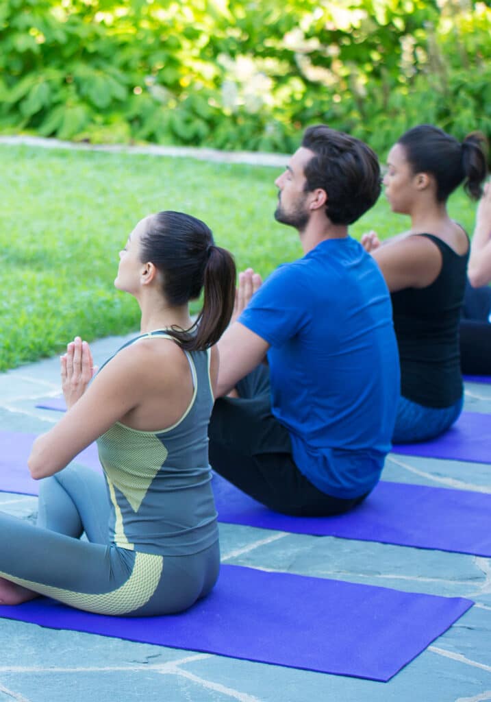 Guests doing yoga at the luxury 5-star spa of the Salamander Middleburg.