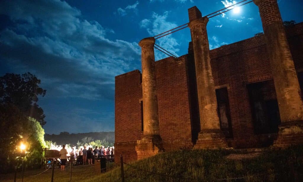 A moody night sky at Barboursville Vineyards with Shakespeare at the Ruins performed in the background.