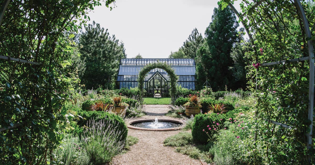 The beautiful English greenhouse at Waterperry Farm & Gardens retreat near Charlottesville.