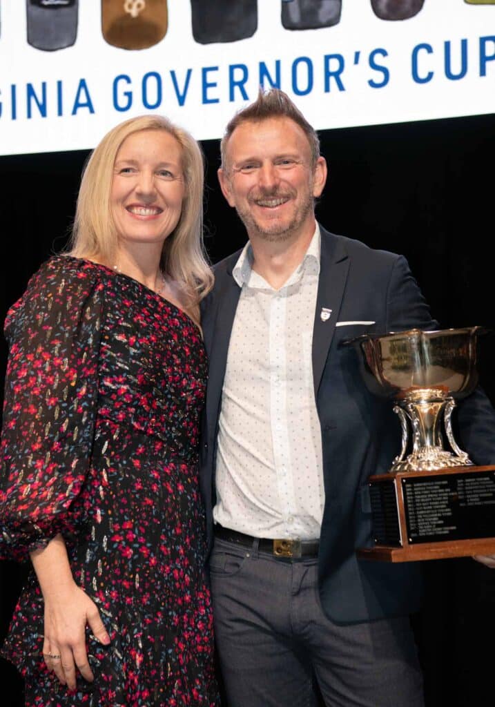 Photo of King Family Vineyards winemaker, Mathieu Finot, accepts his third Virginia Governor's Cup in 2024 with wife Erin.